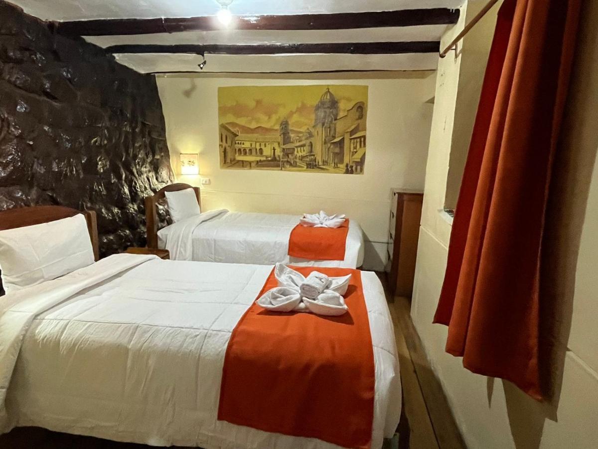 ホテル Hostal Andenes De Alabado クスコ エクステリア 写真