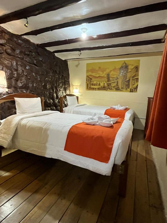 ホテル Hostal Andenes De Alabado クスコ エクステリア 写真