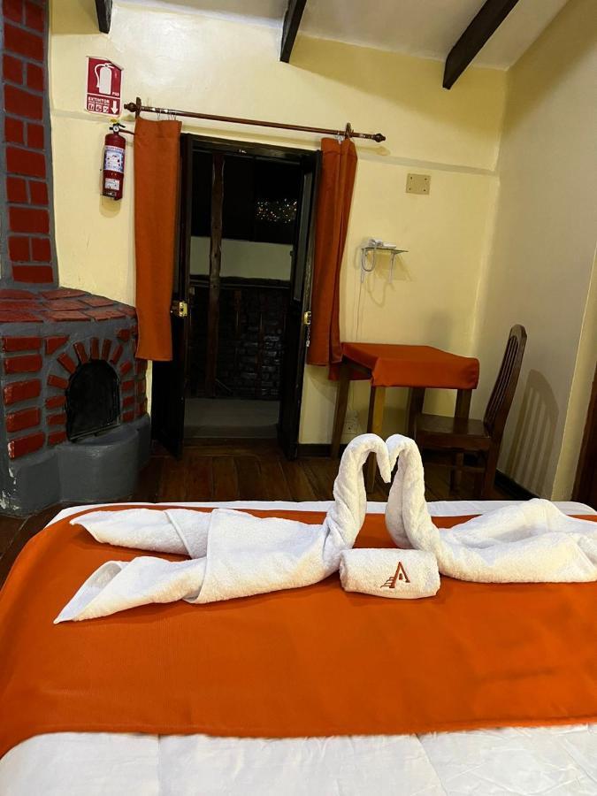 ホテル Hostal Andenes De Alabado クスコ エクステリア 写真