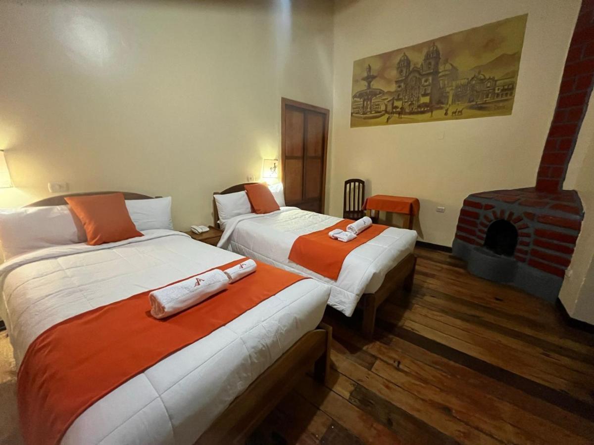 ホテル Hostal Andenes De Alabado クスコ エクステリア 写真