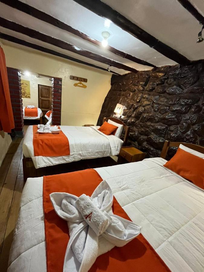 ホテル Hostal Andenes De Alabado クスコ エクステリア 写真