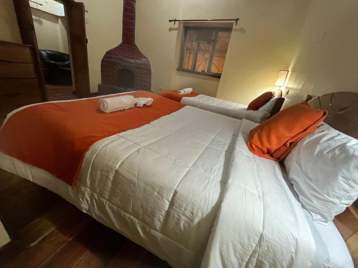 ホテル Hostal Andenes De Alabado クスコ エクステリア 写真