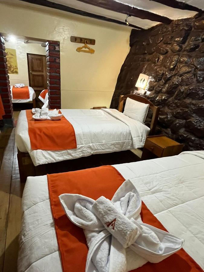 ホテル Hostal Andenes De Alabado クスコ エクステリア 写真