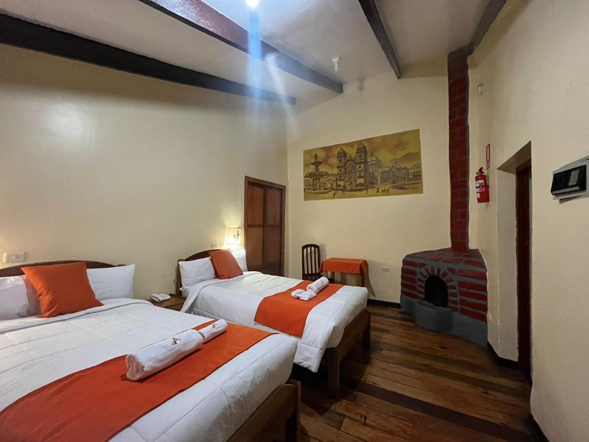 ホテル Hostal Andenes De Alabado クスコ エクステリア 写真