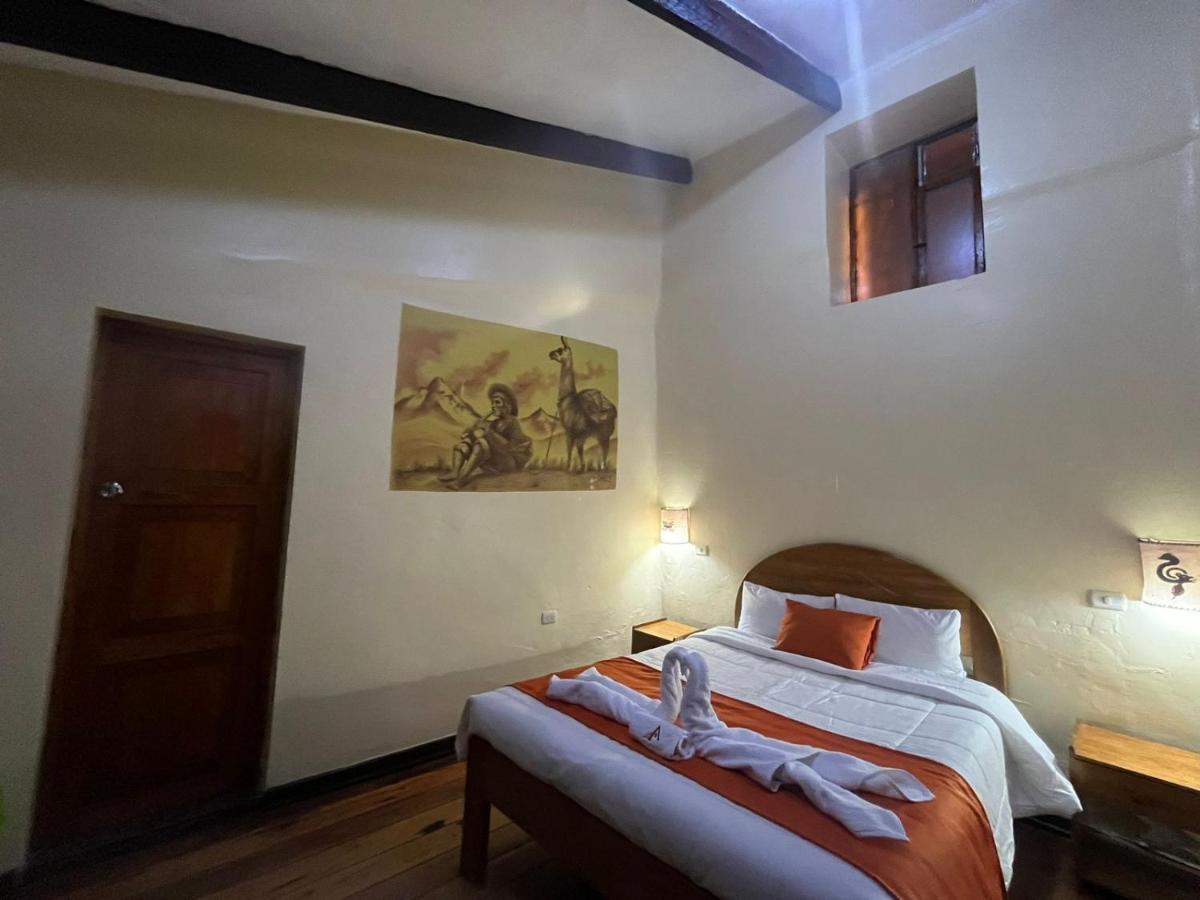 ホテル Hostal Andenes De Alabado クスコ エクステリア 写真