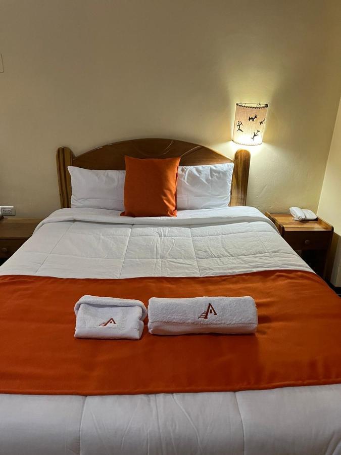 ホテル Hostal Andenes De Alabado クスコ エクステリア 写真