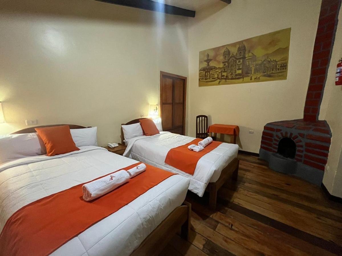 ホテル Hostal Andenes De Alabado クスコ エクステリア 写真