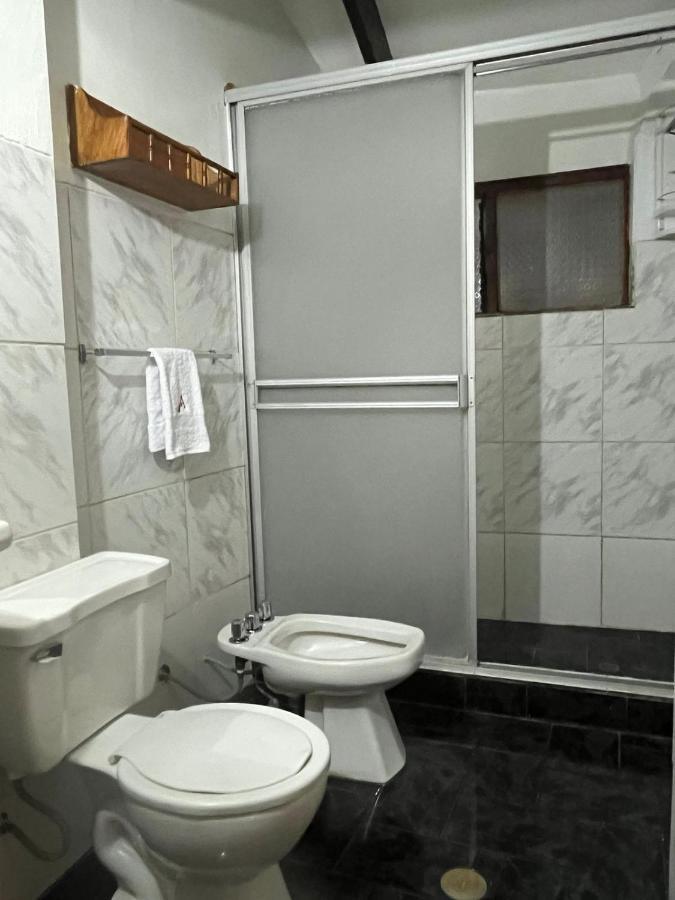 ホテル Hostal Andenes De Alabado クスコ エクステリア 写真
