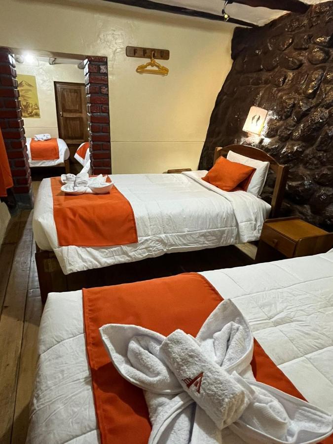 ホテル Hostal Andenes De Alabado クスコ エクステリア 写真