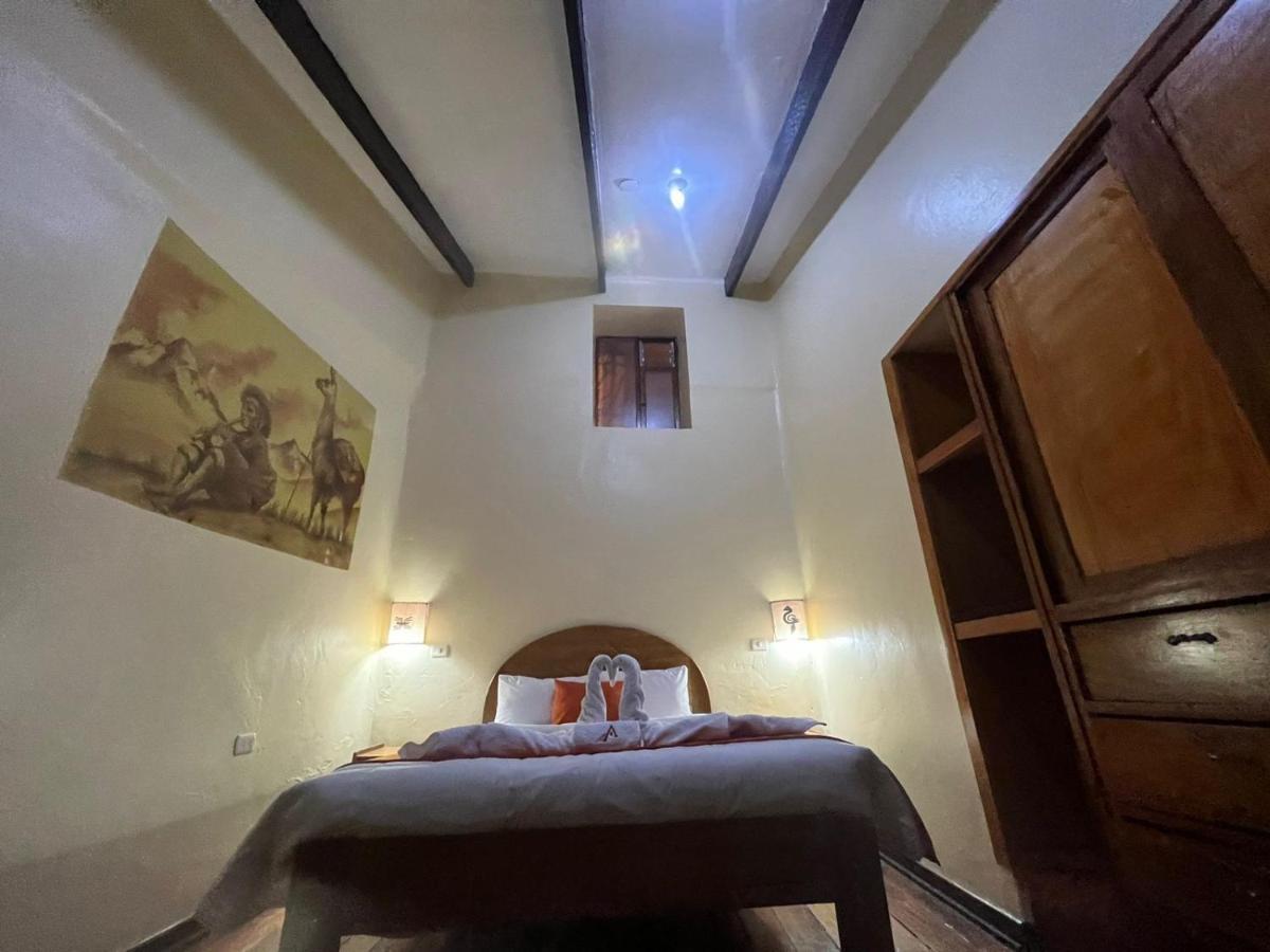 ホテル Hostal Andenes De Alabado クスコ エクステリア 写真