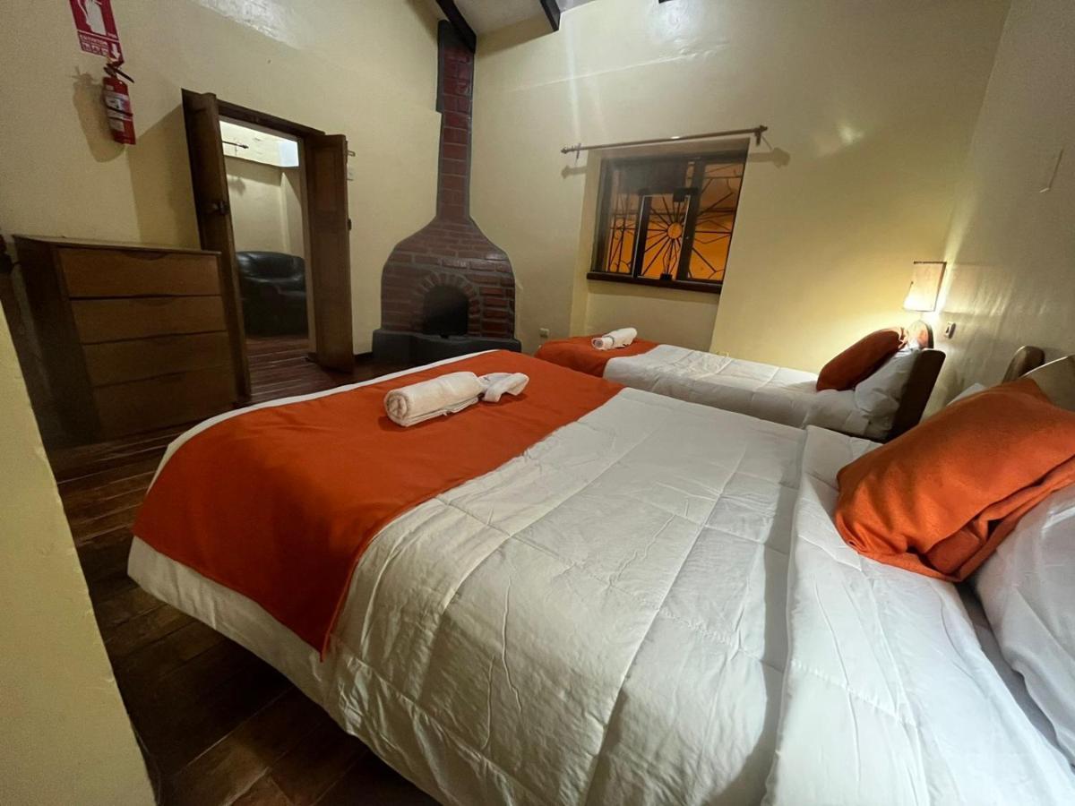 ホテル Hostal Andenes De Alabado クスコ エクステリア 写真