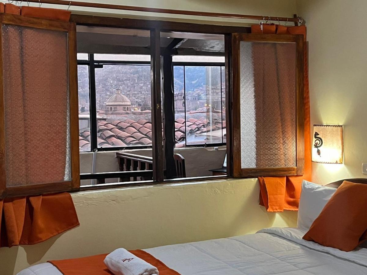 ホテル Hostal Andenes De Alabado クスコ エクステリア 写真