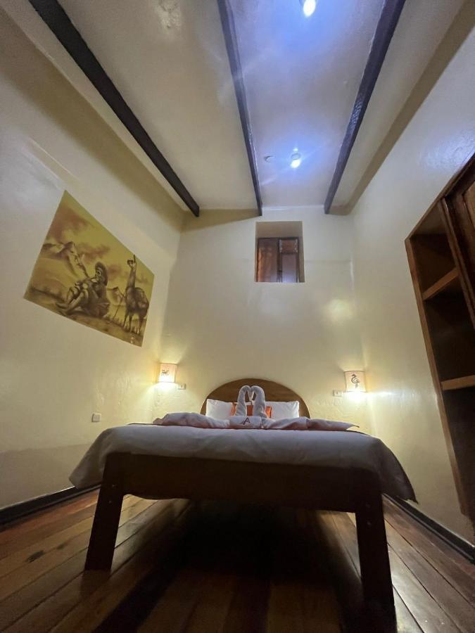 ホテル Hostal Andenes De Alabado クスコ エクステリア 写真
