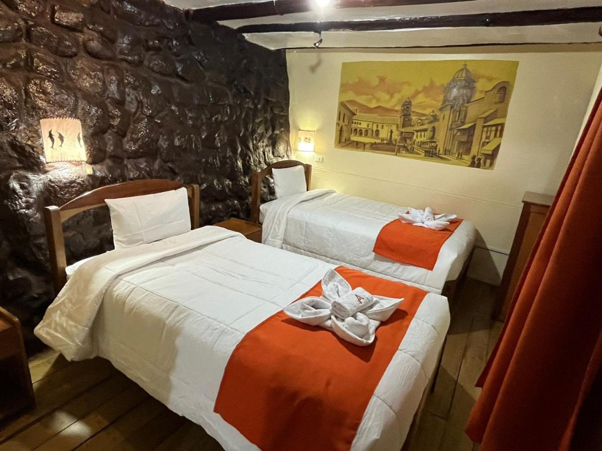 ホテル Hostal Andenes De Alabado クスコ エクステリア 写真