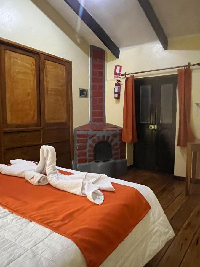 ホテル Hostal Andenes De Alabado クスコ エクステリア 写真