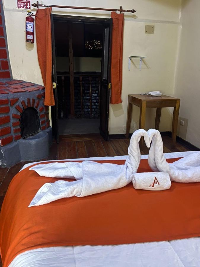 ホテル Hostal Andenes De Alabado クスコ エクステリア 写真