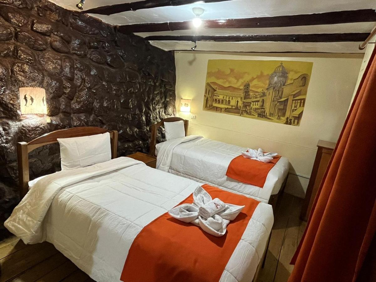 ホテル Hostal Andenes De Alabado クスコ エクステリア 写真